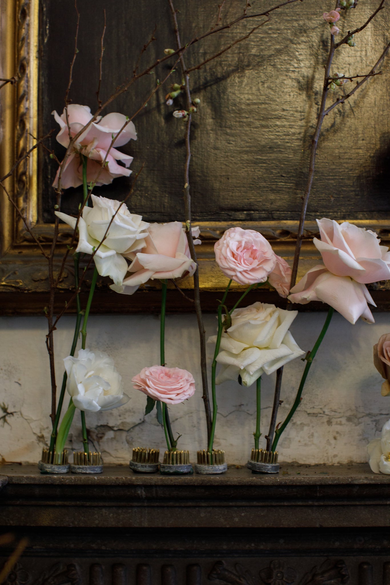 Rose floral arrangement on a mantelpiece